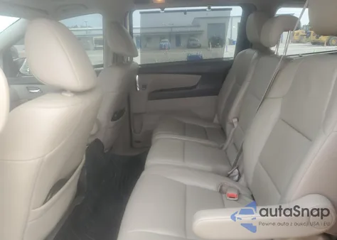 2016 Honda Odyssey Touring z USA, uszkodzony, nr VIN 5FNRL5H98GB080139